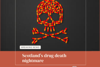 news article scotland drug deaths image of skull made of pills words breaking news in a button