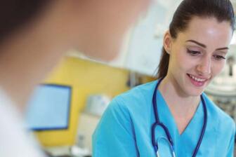Medical professional discussing addiction treatments in rehab program