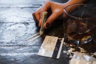 Image showing alcohol and drugs, illustrating addiction risks.