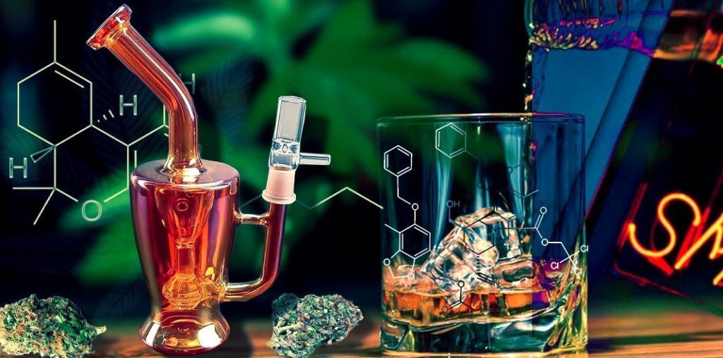 Glass bong and whiskey glass symbolizing alcohol and drugs