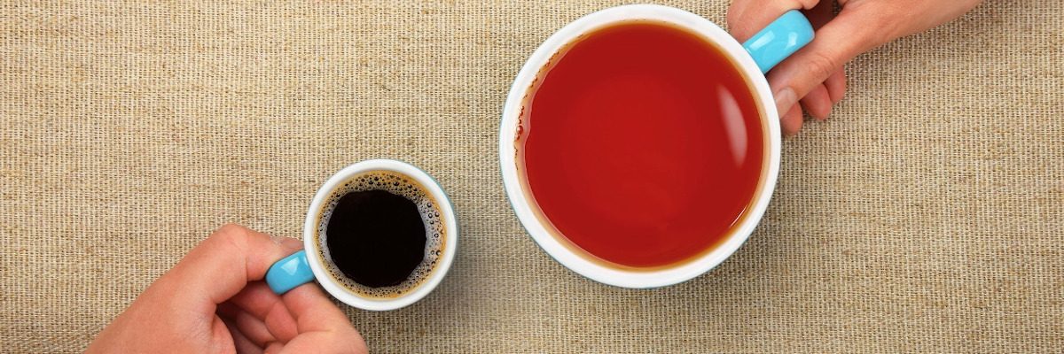 Two hands holding cups of coffee and tea, promoting alcohol free activities