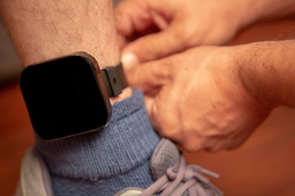 Close-up of alcohol monitoring bracelet used in rehab programs