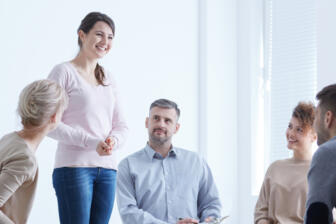 Alcohol rehab Barking group discussion in a bright room
