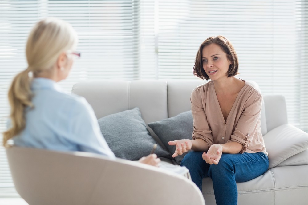 Therapist and client discussing alcohol rehab Newry support
