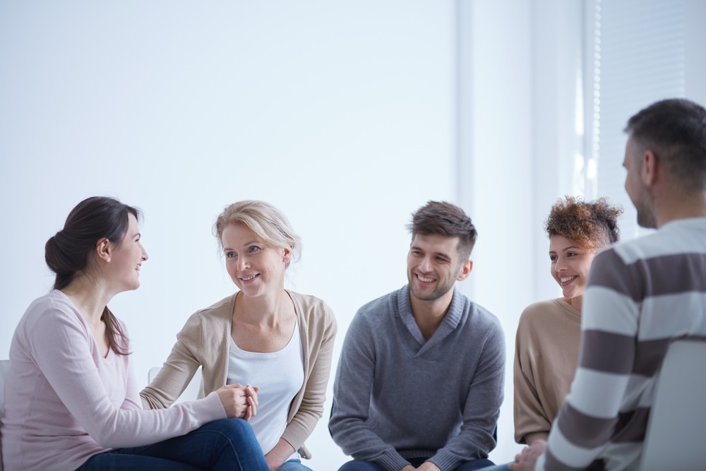 Group in discussion at alcohol rehab Rotherham, sharing recovery support