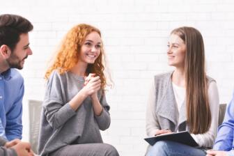 People in group therapy discussing alcohol rehab in South East England