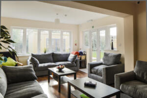 Comfortable counseling room in Alcohol Rehab Surrey facility, sofas and natural light