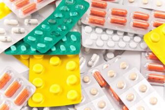 Various pill packs symbolizing drug addiction challenges