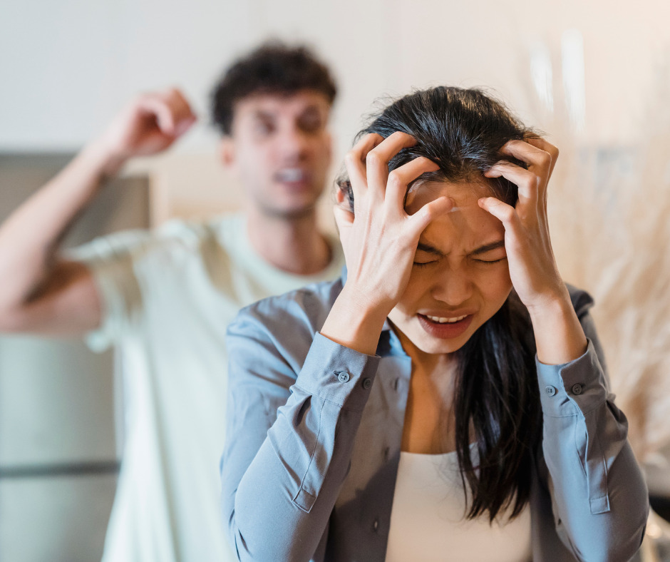 Frustrated woman coping with an angry drunk spouse, seeking help
