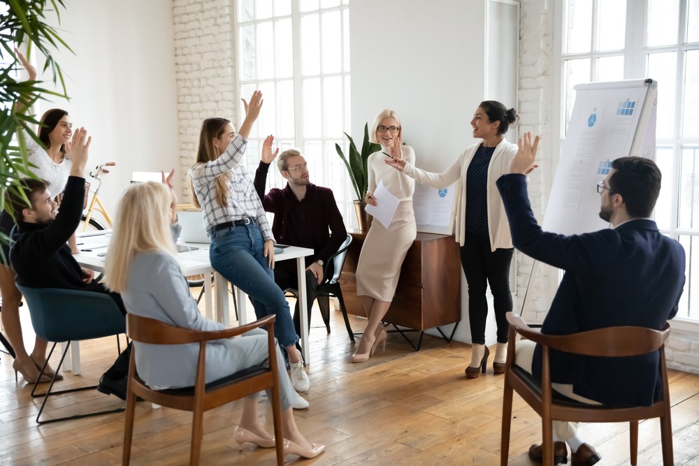 Group of people engaging in discussion, related to recovery quotes