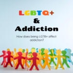 Colorful paper figures representing LGBTQ+ community in addiction context