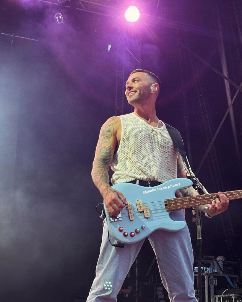 Musician performing on stage, advocating Matt Willis Addiction recovery journey