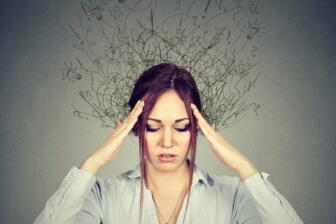 Woman stressing with chaotic thoughts while quitting alcohol