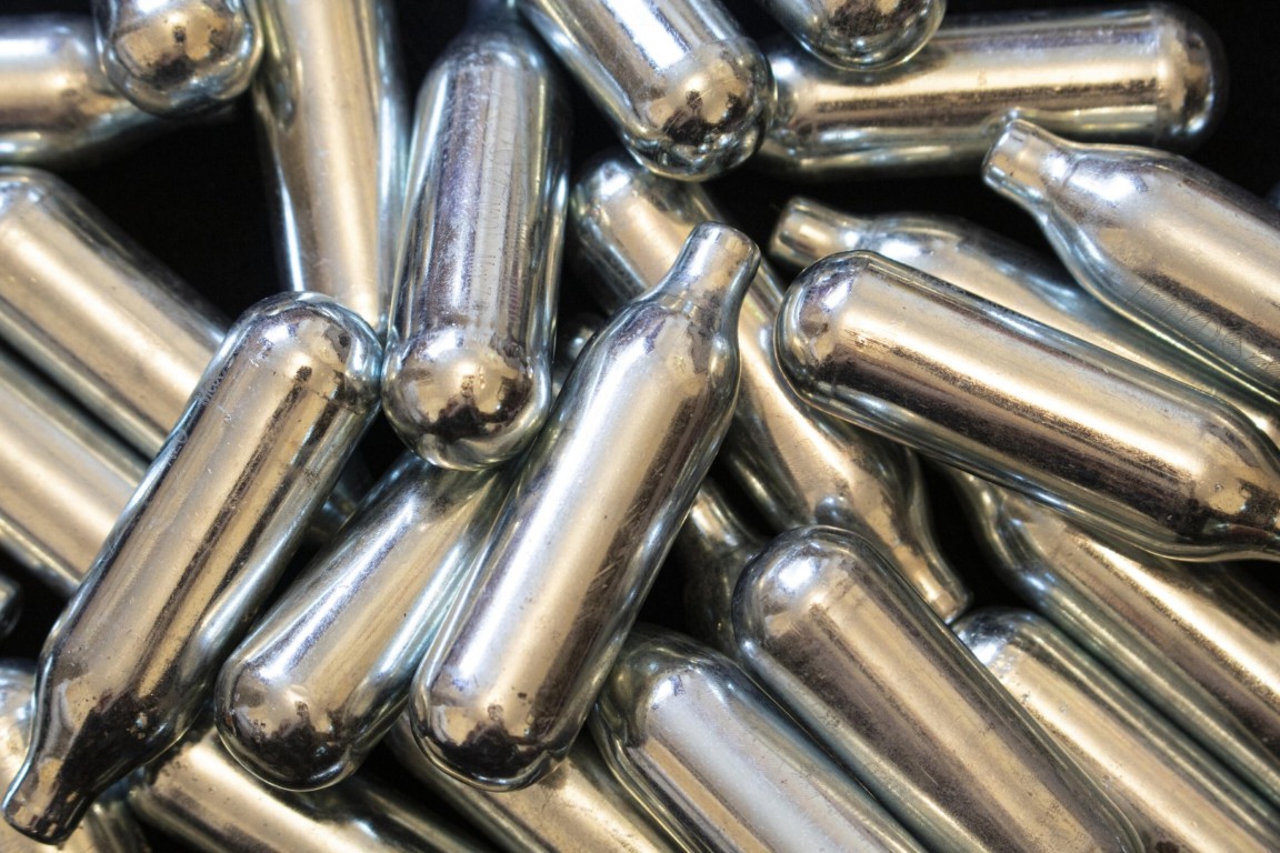Nitrous oxide abuse and recovery support with metal canisters