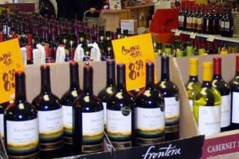 Rows of alcohol bottles depicting temptation in recovery journey