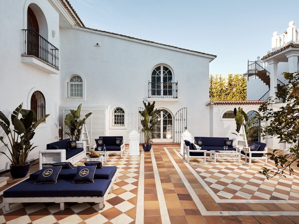 Serene courtyard at rehab center with seating for alcohol recovery