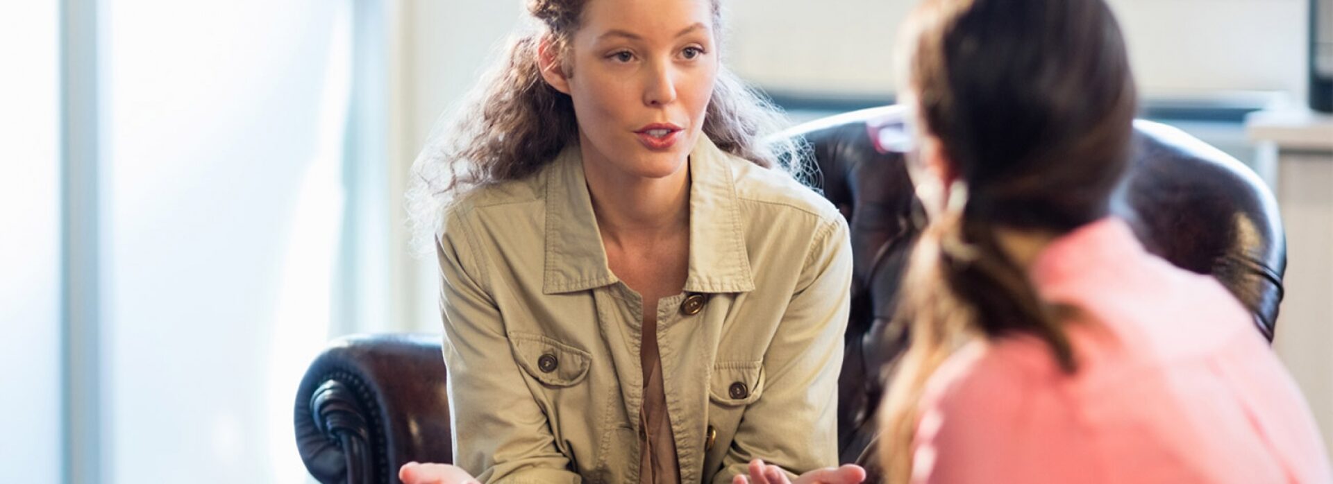 Counselor providing advice in rehab Chelmsford clinic setting