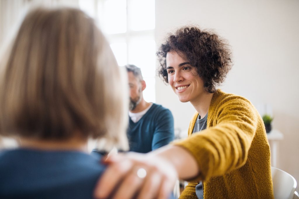 Rehab Guildford session with supportive individuals in group therapy