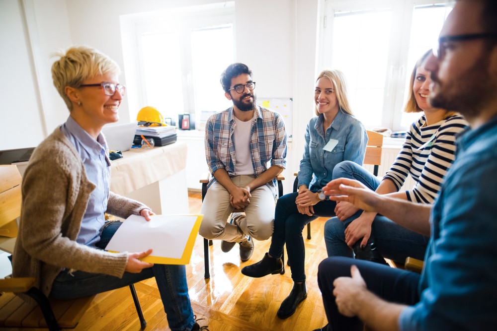 Group therapy session for alcohol recovery at rehab in Inverness