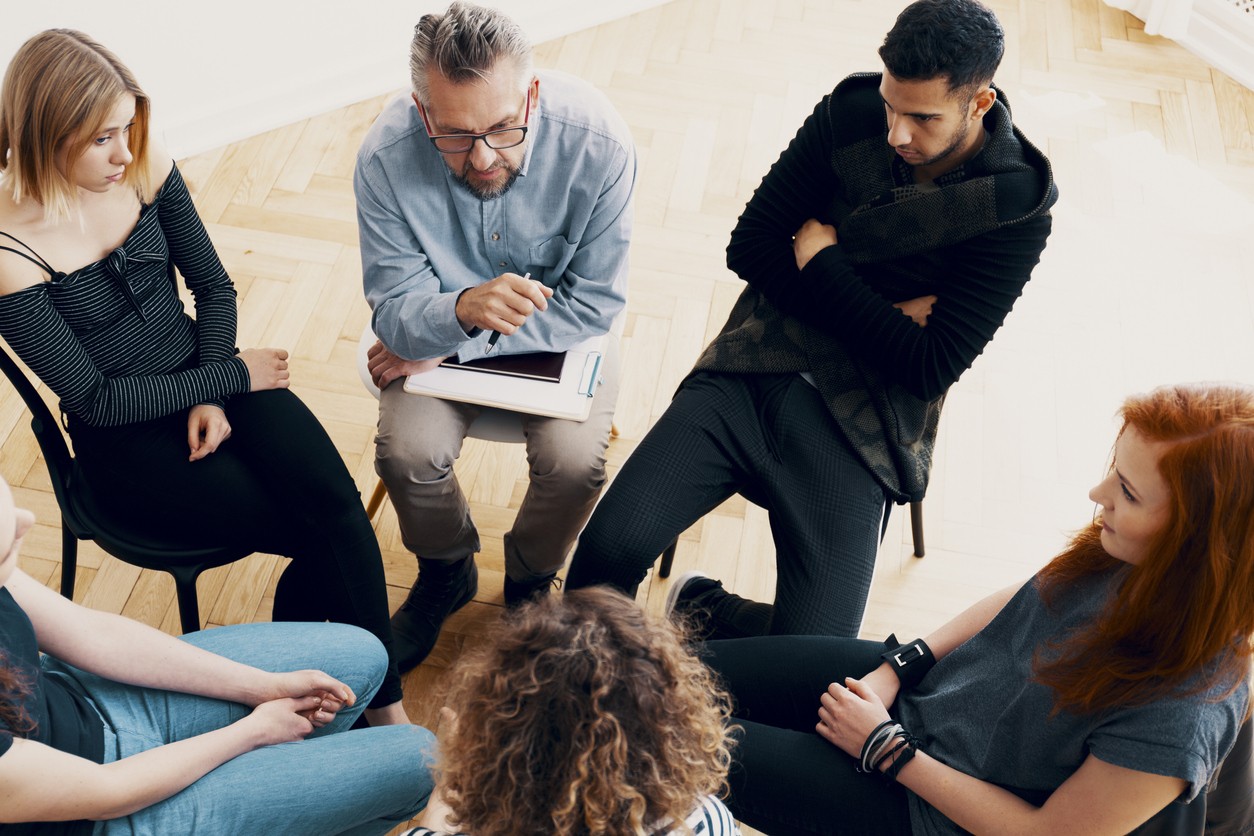 Group therapy session for alcohol recovery at rehab North Tawton.