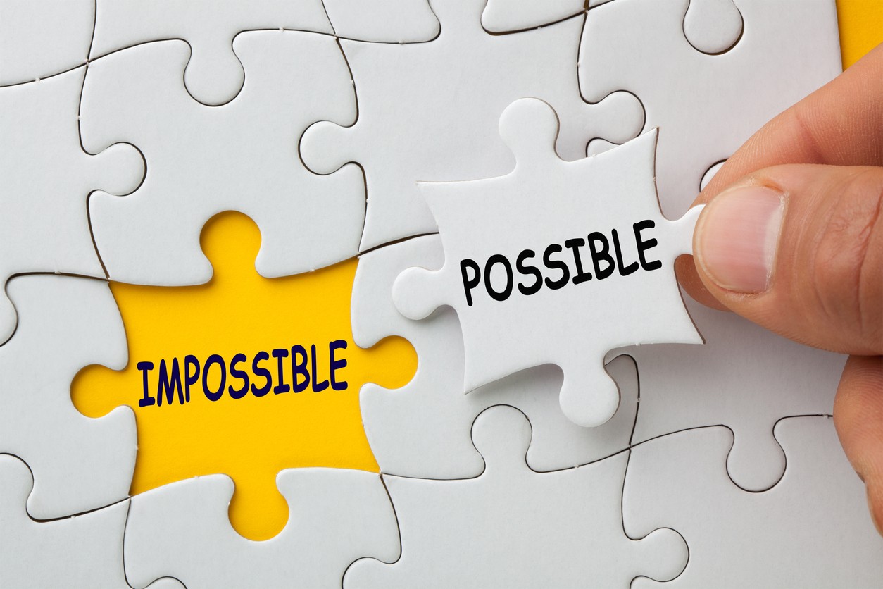 Puzzle piece labeled "possible" fitting into "impossible" for staying sober