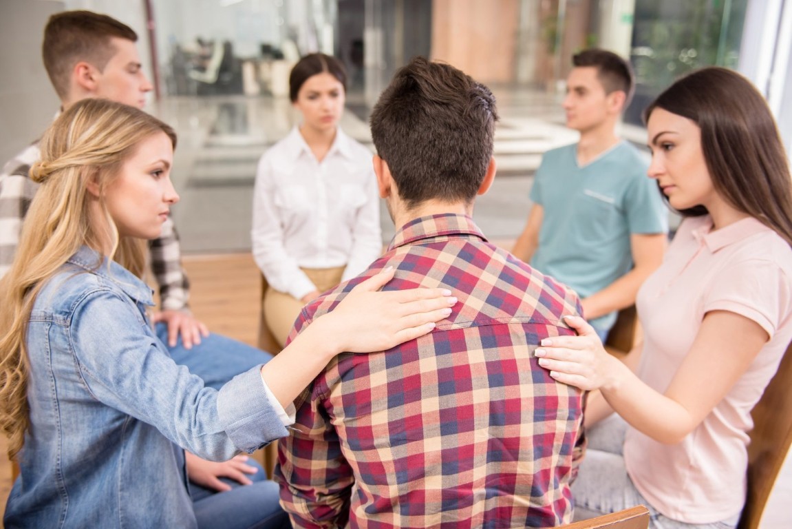 Support group discussing cocaine side effects and addiction recovery