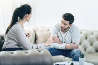 Therapist and client discussing alcohol rehab